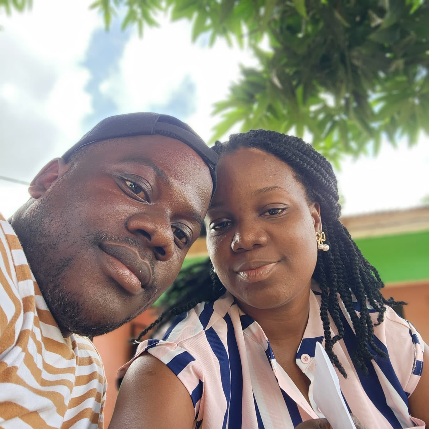 The couple together outdoors